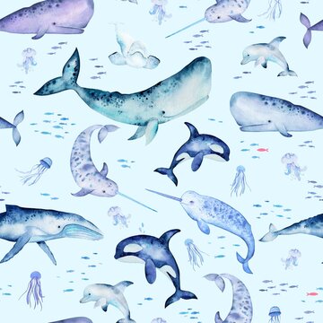Watercolor pattern with marine mammals. Cute whales, narwhals, dolphins, fish and jellyfish on minty blue. Colorfull seamless background for textile, wallpapers, print and banners.