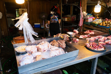 Meat counter in a street market asia.