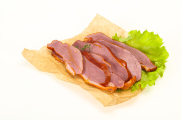 Sliced smoked duck breast served salad