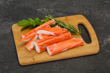 Crab stick surimi over board