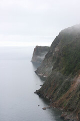 Baikal Lake in summer. View of the  Olkhon Island in rainy and foggy weather.  Lake natural background. Beautiful landscape background with copy space