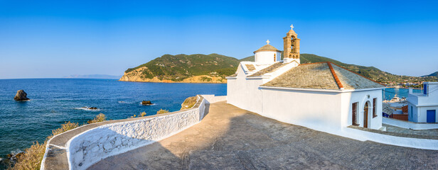 View of Panagitsa Tou Pirgou church over the bay, Skopelos, Greece