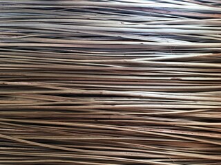 Natural straw texture. Horizontal stripes of smooth dry grass. Natural background for design.. High quality photo