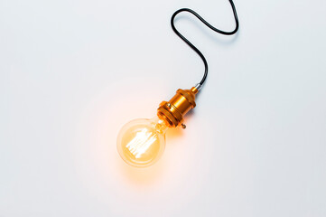 Creative idea concept, designer lamp, modern interior item. Vintage fashionable edison lamp on...
