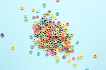 Colorful corn rings on blue background