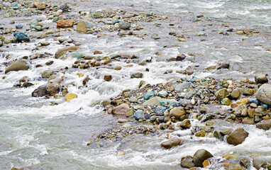  Various stones in the mountain river.