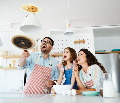 Family Child Kitchen Food Daughter Mother Father Cooking Preparing Pancake Breakfast  Happy Together