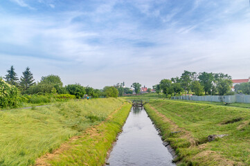 Fototapeta na wymiar Small river Labunka in Zamosc, Poland.