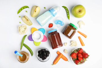 Obraz na płótnie Canvas Flat lay composition with baby food, ingredients and accessories on white background