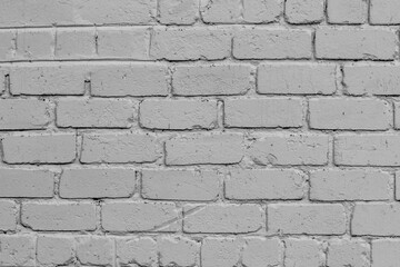 White brick wall: facade of a modern building in bright light