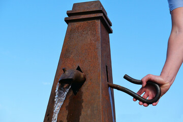 Water pump on the street. International Water Day.