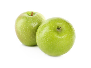 Fresh juicy green apples with water drops isolated on white