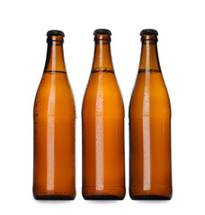 Brown bottles with beer isolated on white