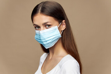 Model in white shirt in a protective mask health i