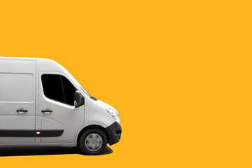 Side view of white delivery truck on yellow background. Delivery concept