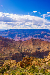 Panoramic image of the colorful Sunset on the Grand Canyon in Grand Canyon National Park from the south rim part,Arizona,USA, on a sunny cloudy day with blue or gloden sky