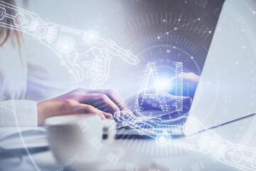 Multi exposure of woman hands working on computer and data theme hologram drawing. Tech concept.