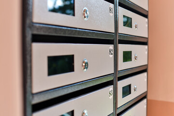 metal mailbox in the appartment building. Selective focus.