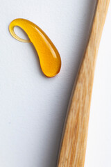 Yellow Gel cosmetic texture. Liquid cream splash.