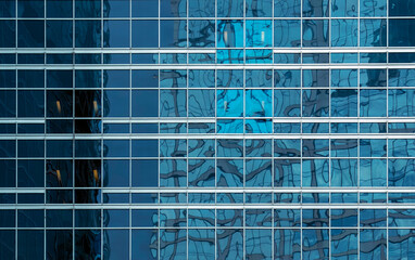 Plakat office building windows texture of blue glass for business background, business center generic facade, front view