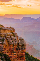 Panoramic image of the colorful Sunset on the Grand Canyon in Grand Canyon National Park from the south rim part,Arizona,USA, on a sunny cloudy day with blue or gloden sky
