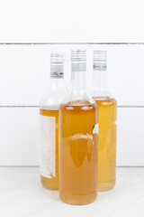 Homemade Elderberry Syrup in the bottles with copy space