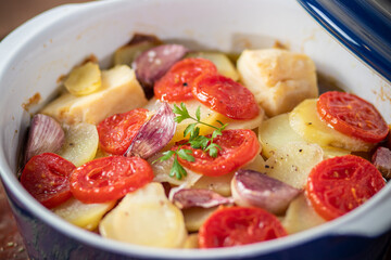 Codfish with tomatos and potatoes