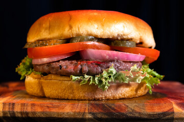 Classic grilled american hamburger with vegetables