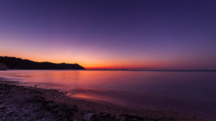 Tramonto sul mare alla baia di Portonovo di Ancona
