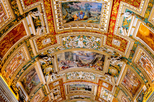 VATICAN, VATICAN CITY - MAY 7, 2016: Paintings on the walls and the ceiling  in the Gallery of Maps, at the Vatican Museum. It was established in 1506