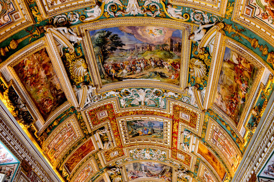 VATICAN, VATICAN CITY - MAY 7, 2016: Paintings on the walls and the ceiling  in the Gallery of Maps, at the Vatican Museum. It was established in 1506