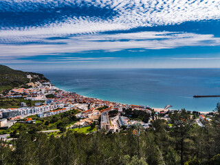 Fototapeta na wymiar Beautiful view of Sesimbra City from Medieval Castle. Ancient Moorish fortification in Portugal. 