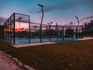 Sports field court to play padel. Blue Hour Sunset
