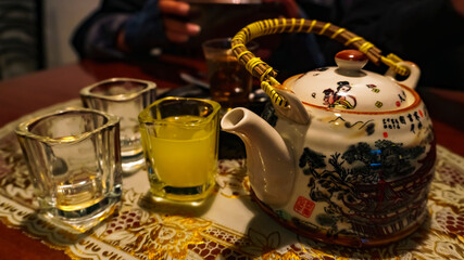 a quiet night having a few drinks of pisco to counteract the cold of the night with some friends
