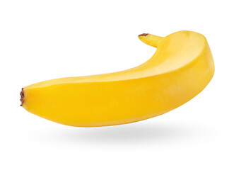 Single ripe banana isolated on white background. Yellow tropical flying fruit with shadow. Organic healthy food. Clipping path included. Studio shot
