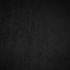 Black concrete stone texture for background in black.  Cement and sand grey dark detail covering.