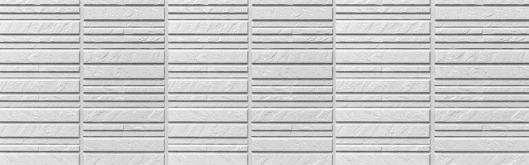 Panorama of Modern white stone wall with stripes texture and seamless background
