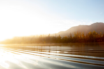 Sunrise over Alaskan lake and mountains