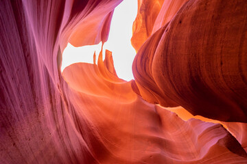 Obraz premium Beautiful wide angle view of amazing sandstone formations in famous Antelope Canyon on a sunny day in the morning near the old town of Page at Lake Powell, American Southwest, Arizona, USA