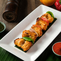 Char grilled Fish Tikka with Carom Seed, Bell Peppers and Onion