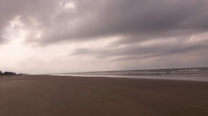 Fototapeta na wymiar storm clouds on the beach