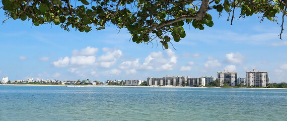 Fort Myers Beach skyline as seen from Big Carlos Pass, Florida, USA.