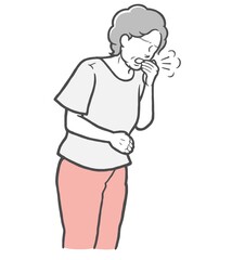 口を手で押さえて咳をする中年女性