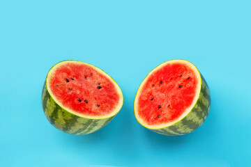 Fresh watermelon on blue background.