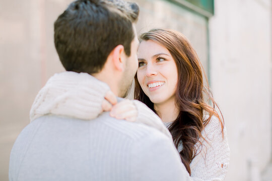 A happy young couple having a romantic moment in an urban setting in West Village in NYC
