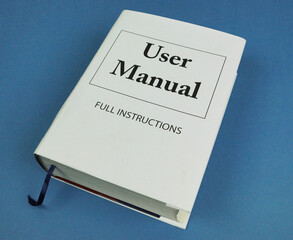 Large Book titled 'User Manual' suggesting that the task is very complicated.