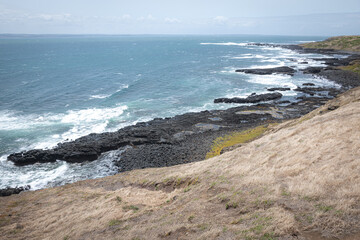 waves crashing on rocks