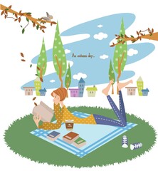 girl reading a book on a picnic mat