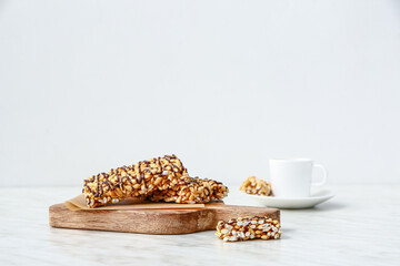 Board with crispy rice bars on table