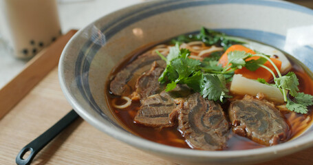 Taiwanese braised beef noodles bowl in restaurant